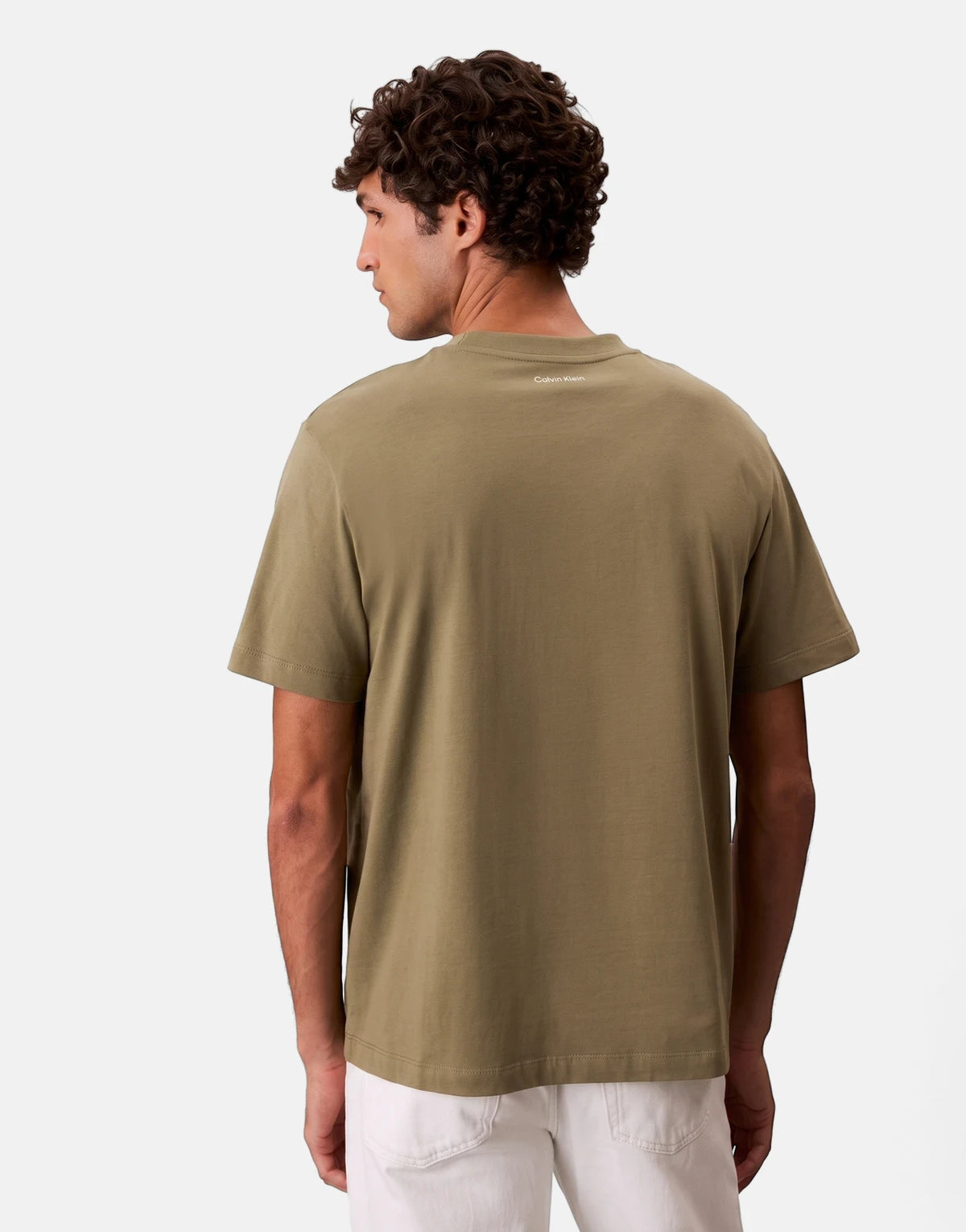 Men's Calvin Klein 20s March Graphic Seasonal Green T-Shirt, short-sleeve, shown from the back on a model.