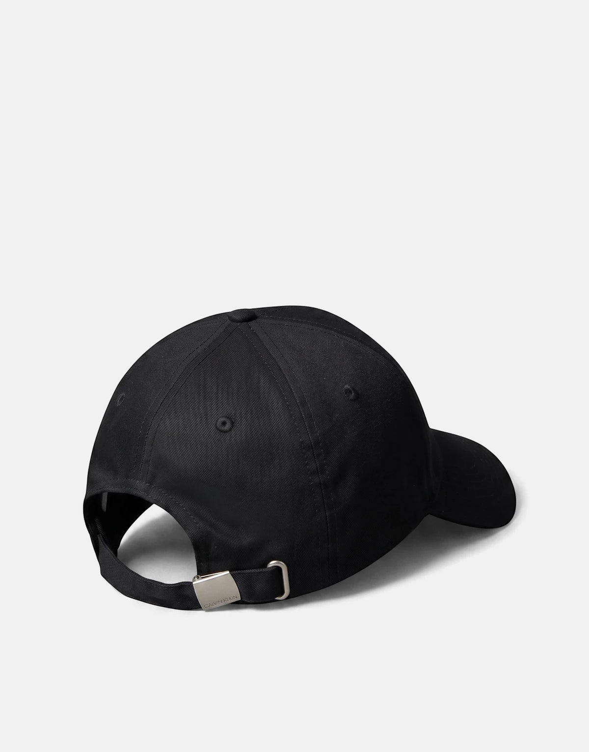 Calvin Klein Heritage Crest Black Patch Cap, rear view, showing adjustable strap with silver buckle. Simple and classic