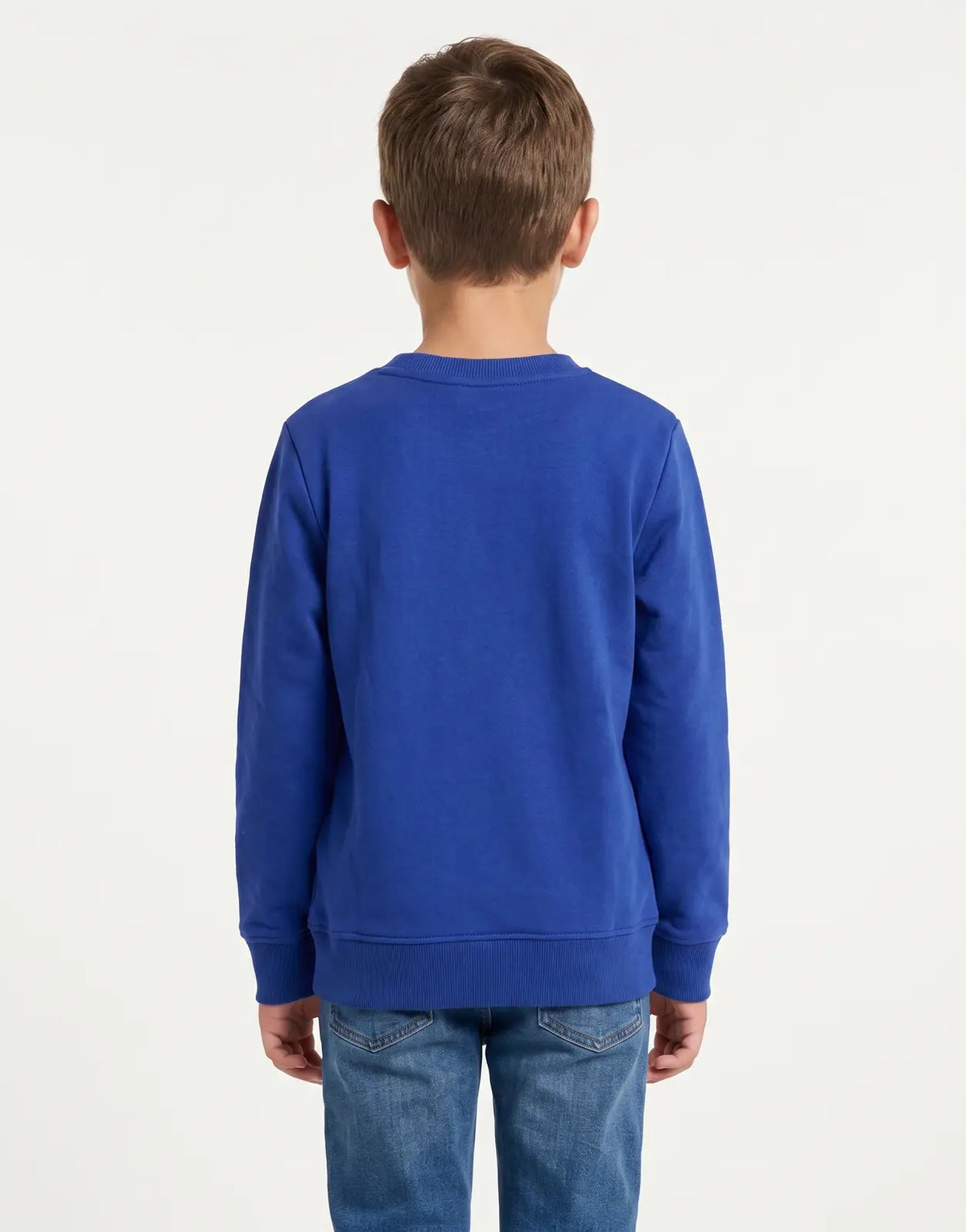 Calvin Klein Kids Chest Inst Logo Regular blue long-sleeve top for boys, styled with blue jeans, viewed from the back.