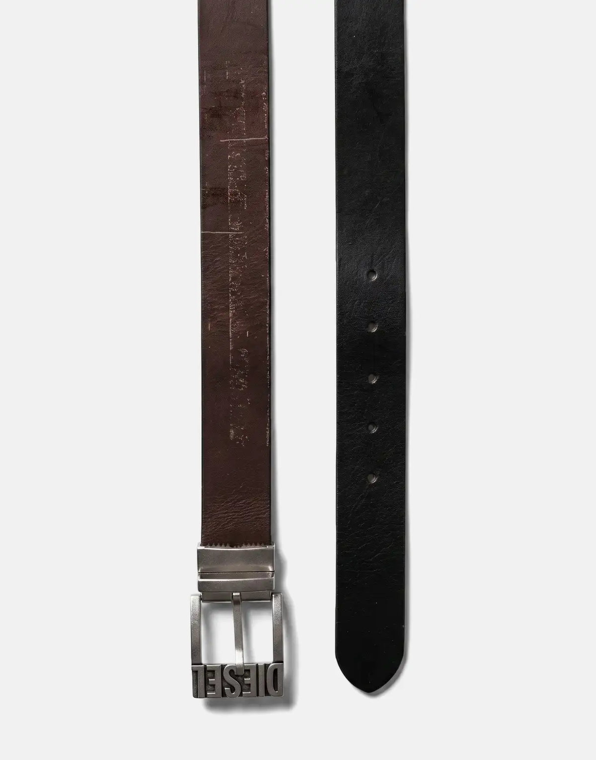 Diesel Logo B-Shift II reversible belt in brown and black leather with a silver-tone buckle, presented vertically.