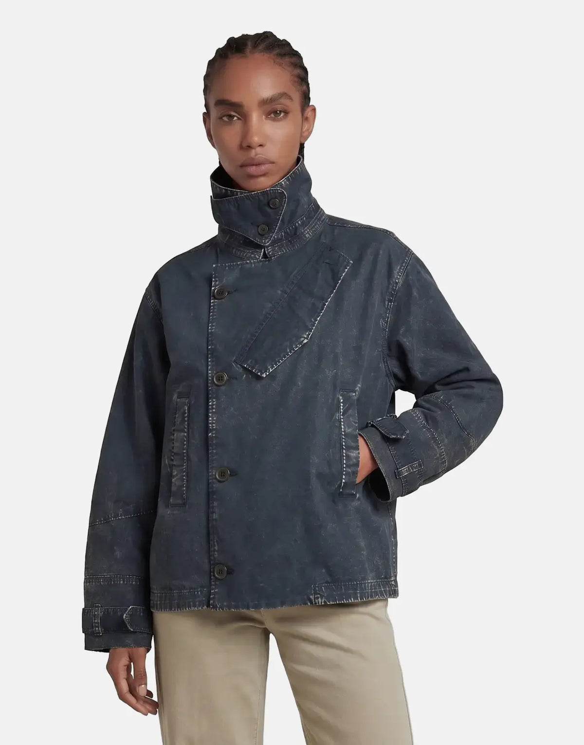 G-Star RAW Oversized Short Trench Coat Overdye Salute in dark blue-grey, shown on a model from the waist up.