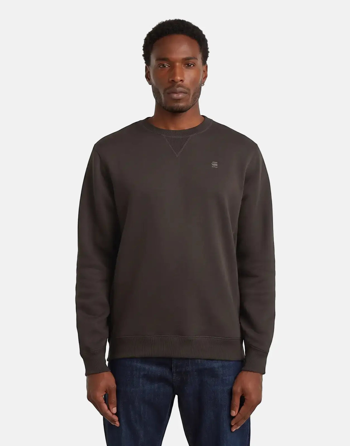 Dark brown G-Star RAW Premium Core Ganache Sweatshirt for men, featuring a classic crew neck and long sleeves, worn by a