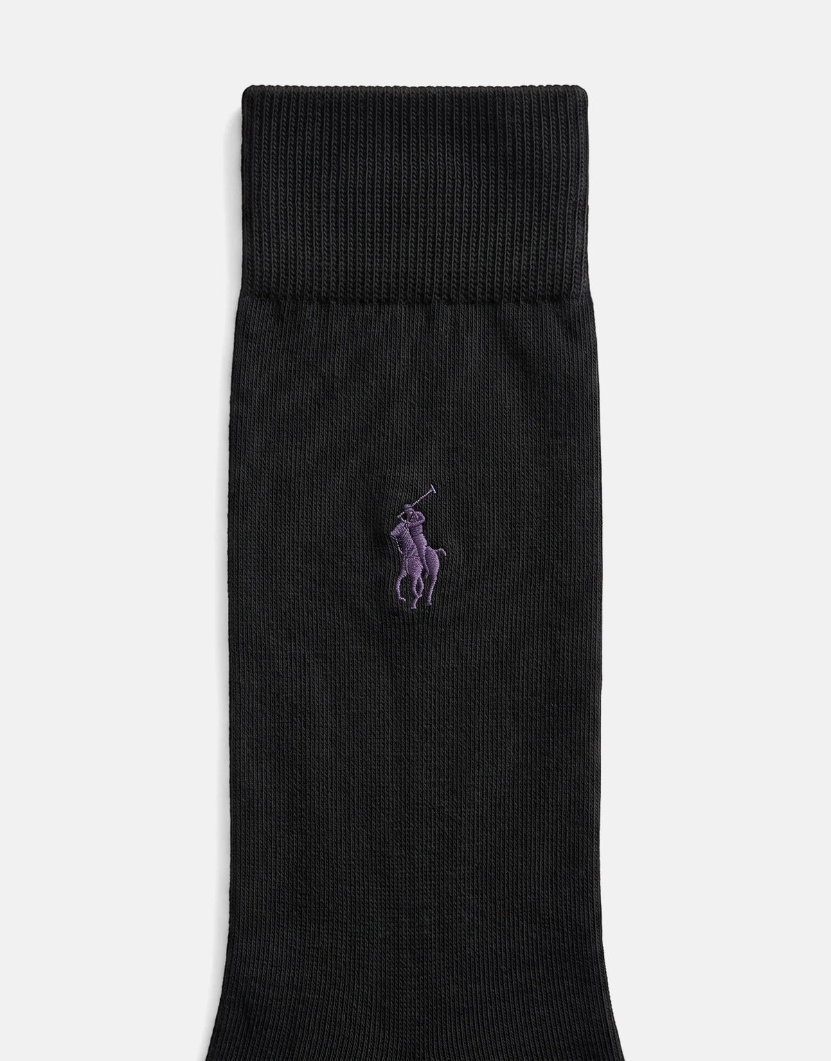 Polo Plain Petrol Socks, black knit, featuring the iconic polo player logo, laid flat on a surface.