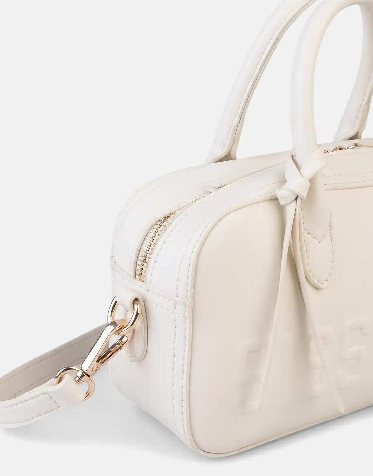 Close-up of an off-white Sissy Boy Emory structured shoulder bag with dual top handles, a gold zipper, and gold hardware.