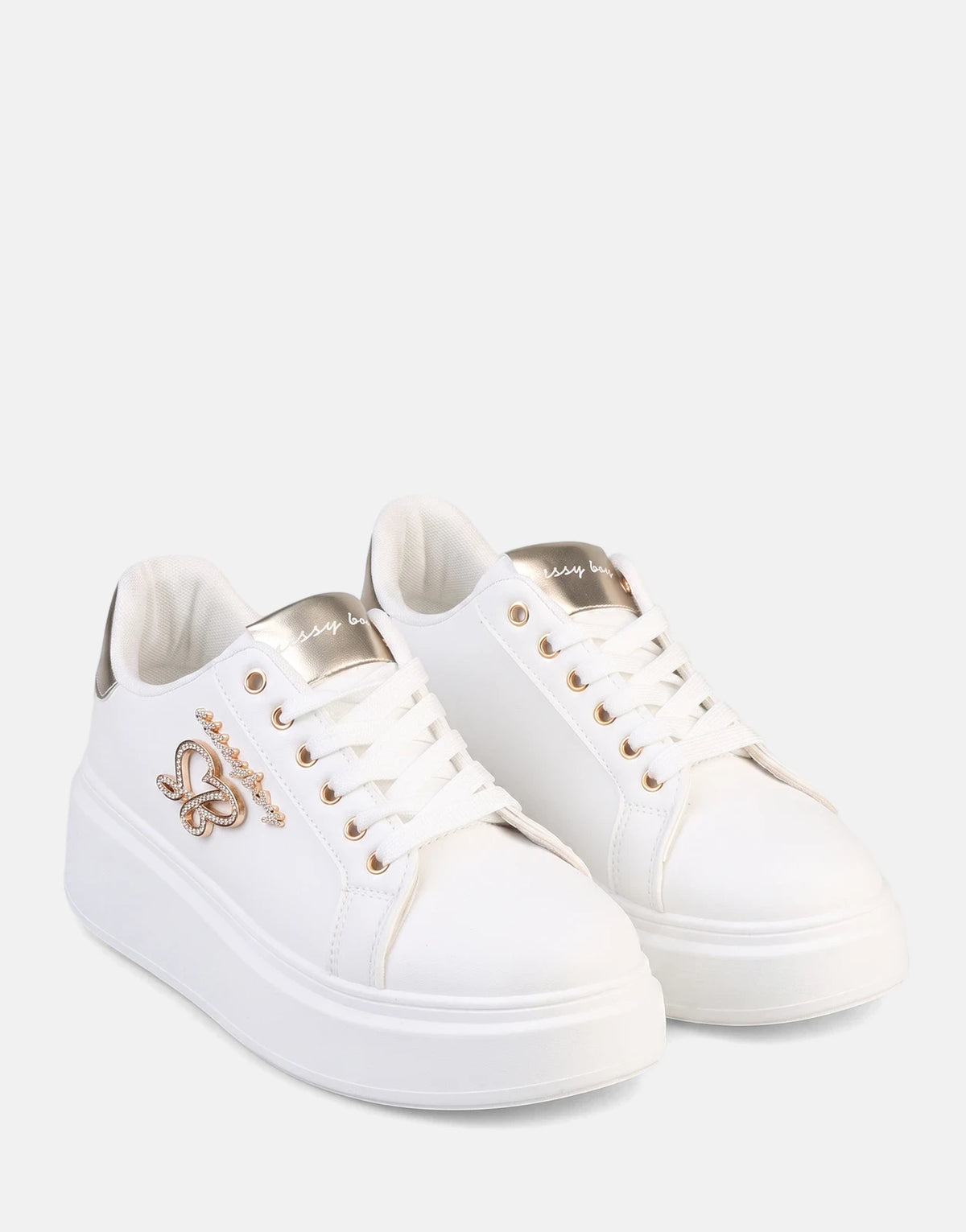 Pair of Sissy Boy Noella white sneakers with gold eyelets, heel accent, and a butterfly logo on the side with rhinestones.