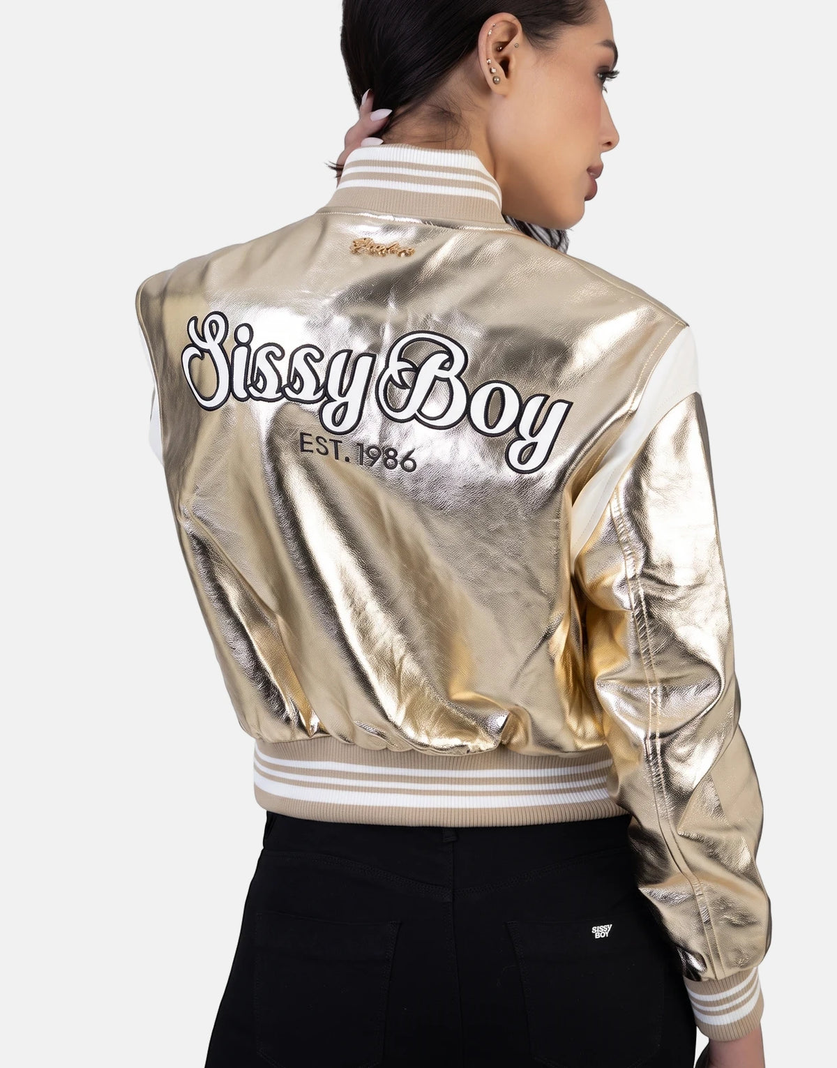 Women's Sissy Boy Take It Easy gold metallic bomber jacket, featuring the 'Sissy Boy EST. 1986' logo on the back.