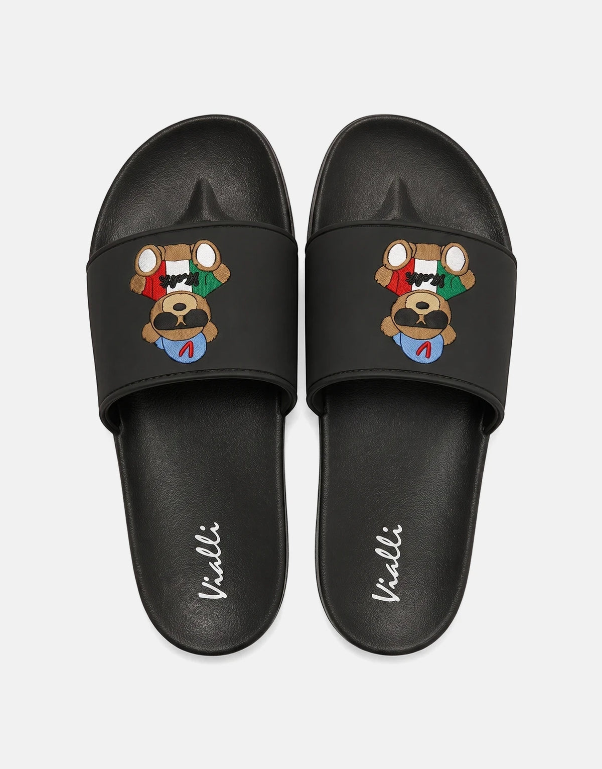 Pair of Vialli Yogi Black Sandals featuring an embroidered bear design on the strap, presented in a flat-lay top-down view.