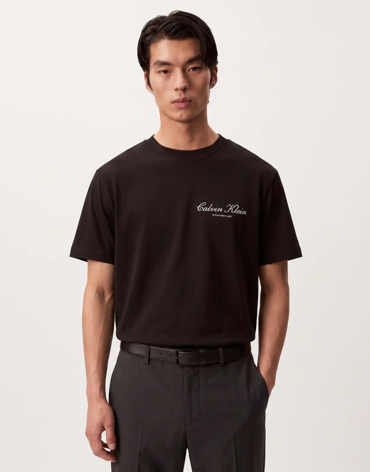 Calvin Klein 20s March Graphic Black T-Shirt, featuring a white 'Calvin Klein ESTABLISHED 1968' logo on the chest, front