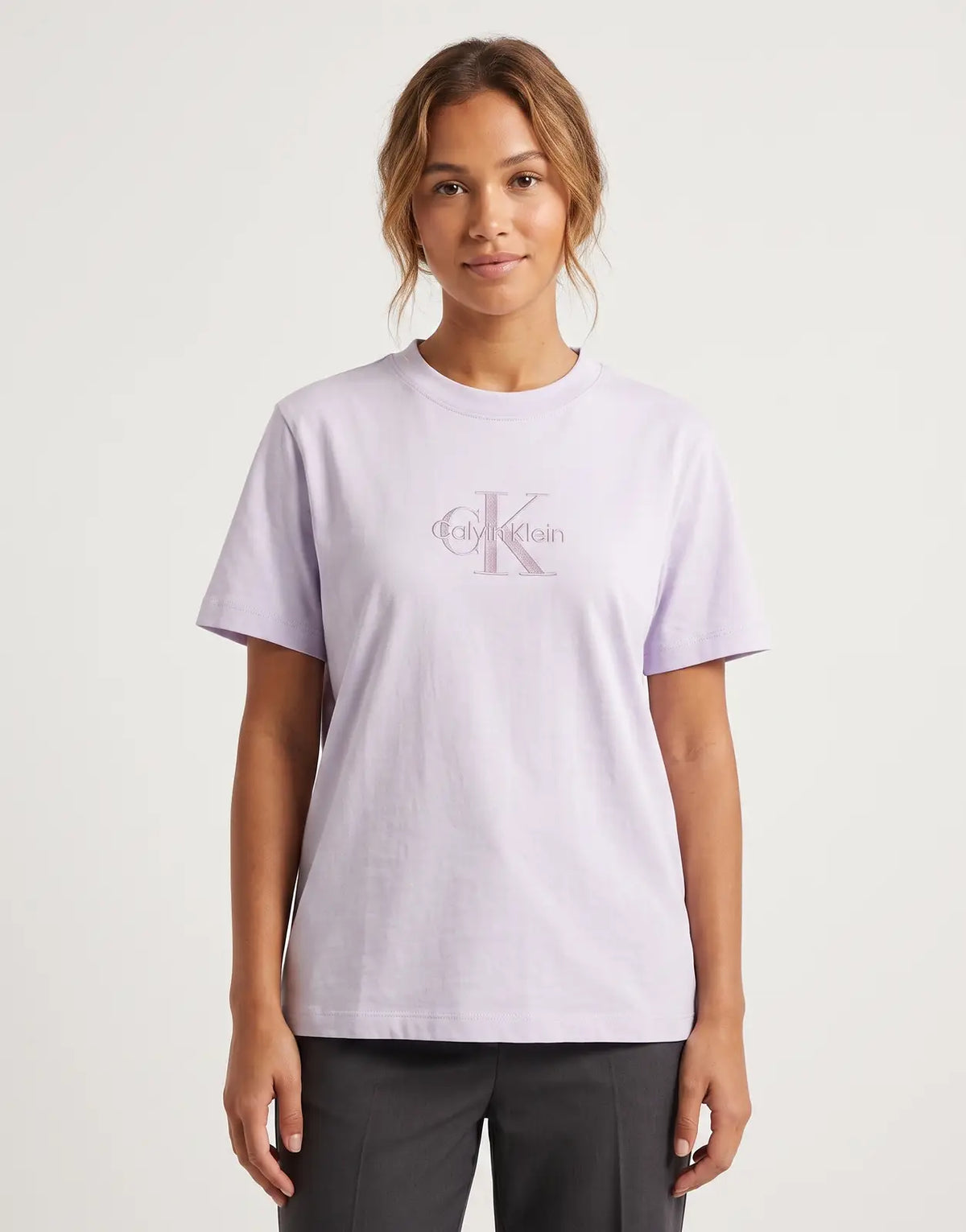 A lilac Calvin Klein Classic Monologo short sleeve t-shirt, featuring a crew neck and the distinctive brand logo. Laid flat