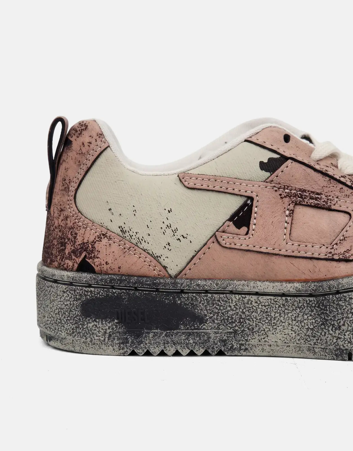 Side view of a Diesel S-Ukiyo V2 Low Sneaker in muted pink and beige with a distressed chunky sole.
