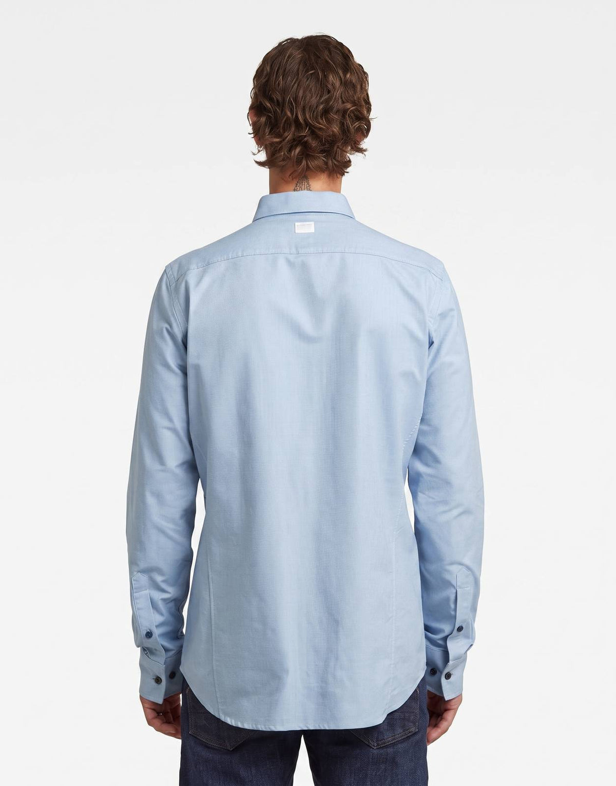 G-Star RAW Uniform Deep Wave Slim Shirt in light blue, long-sleeve, shown from the back on a model.