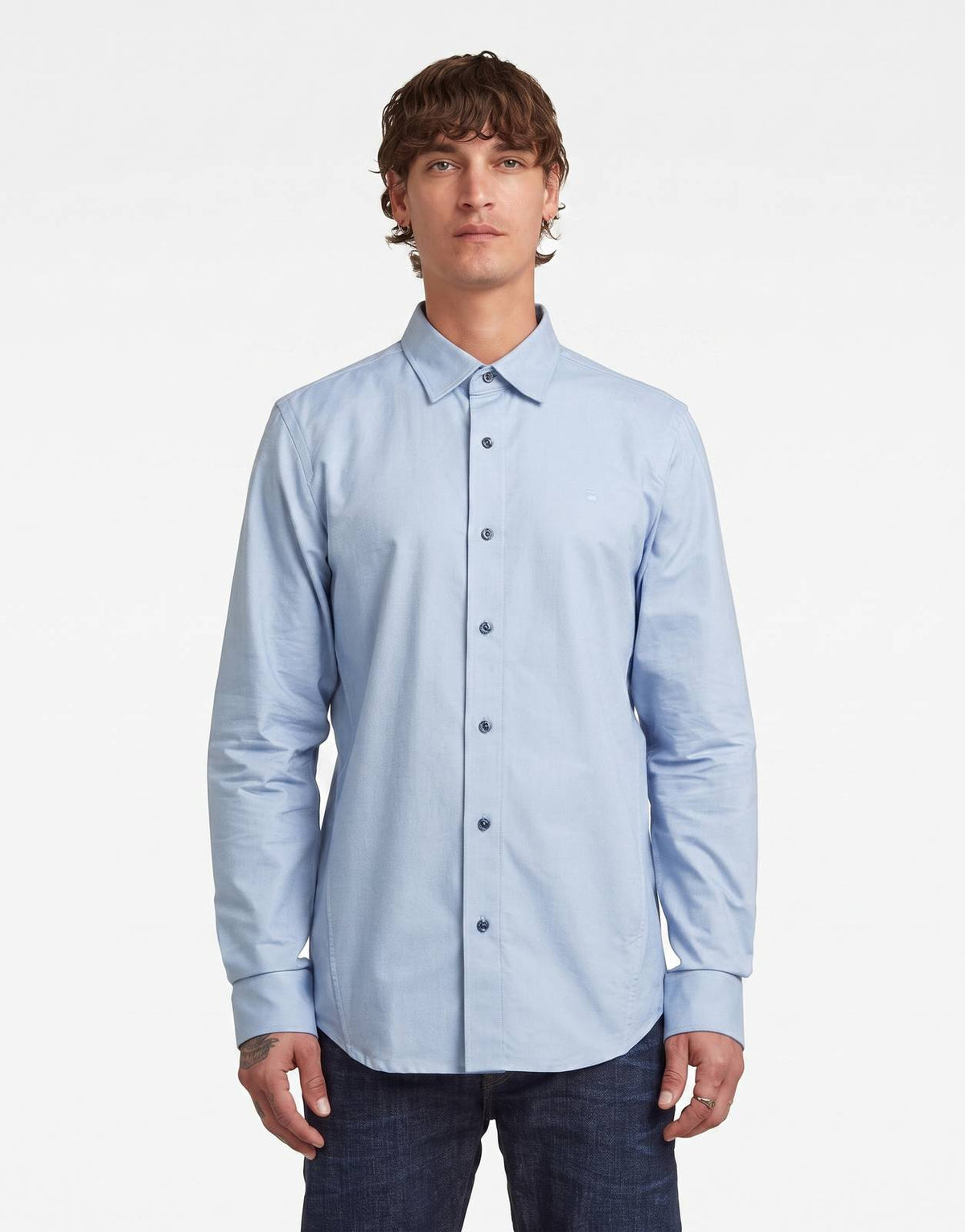 Men's G-Star RAW Uniform Deep Wave Slim Shirt in light blue, front view, showcasing its long sleeves and button-up design.